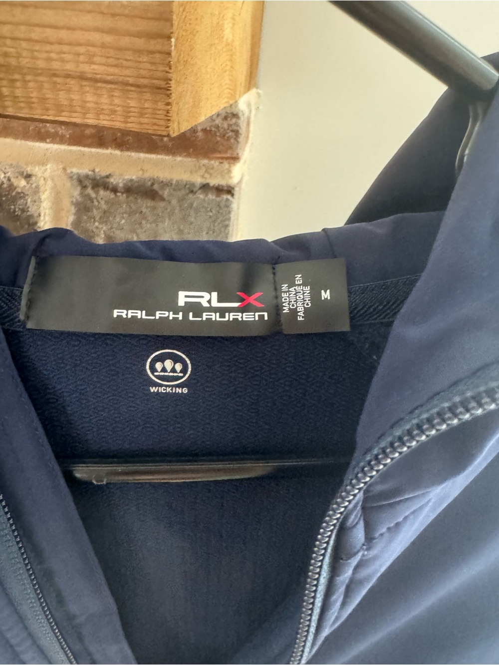 navy RLX Ralph Lauren performance quarter-zip pullover features a distinctive wh
